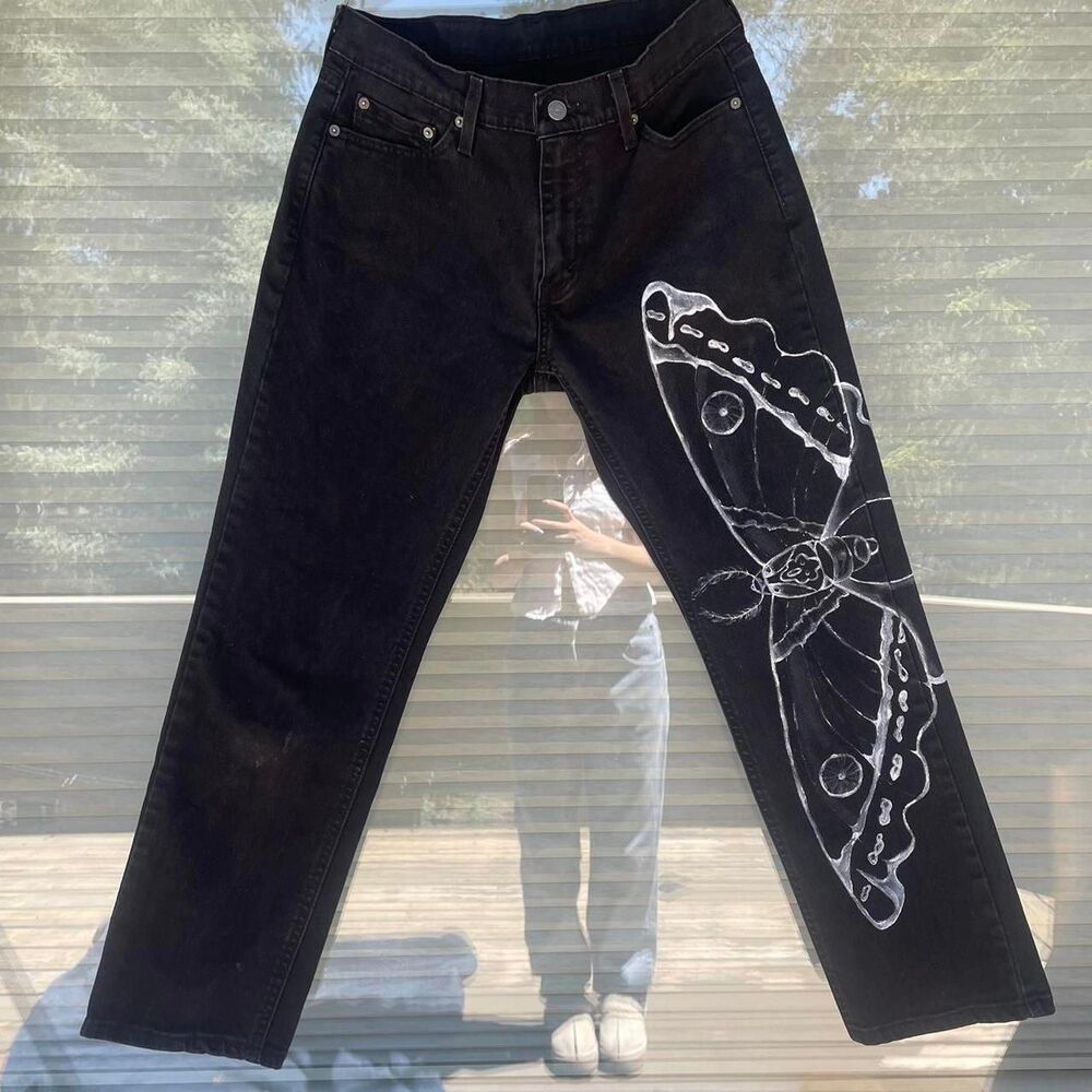 Levi-s Women's Black Jeans with Moth graphic